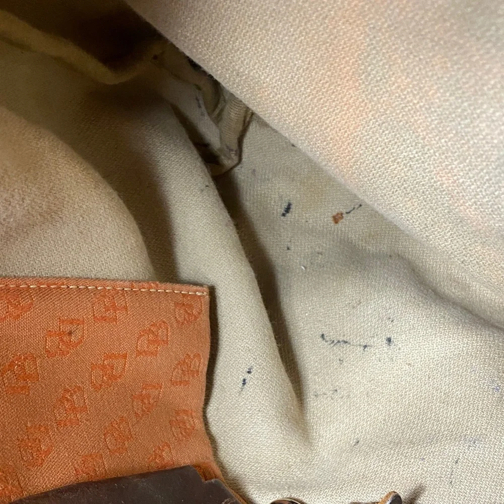 Dooney & Bourke Vintage burnt Orange over the shoulder bucket Bag